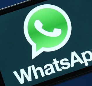 SAN FRANCISCO, CA - FEBRUARY 19:  Facebook and WhatsApp logos are displayed on portable electronic devices on February 19, 2014 in San Francisco City. Facebook Inc. announced that it will purchase smartphone-messaging app company WhatsApp Inc. for $19 billion in cash and stock.  (Photo Illustration by Justin Sullivan/Getty Images)